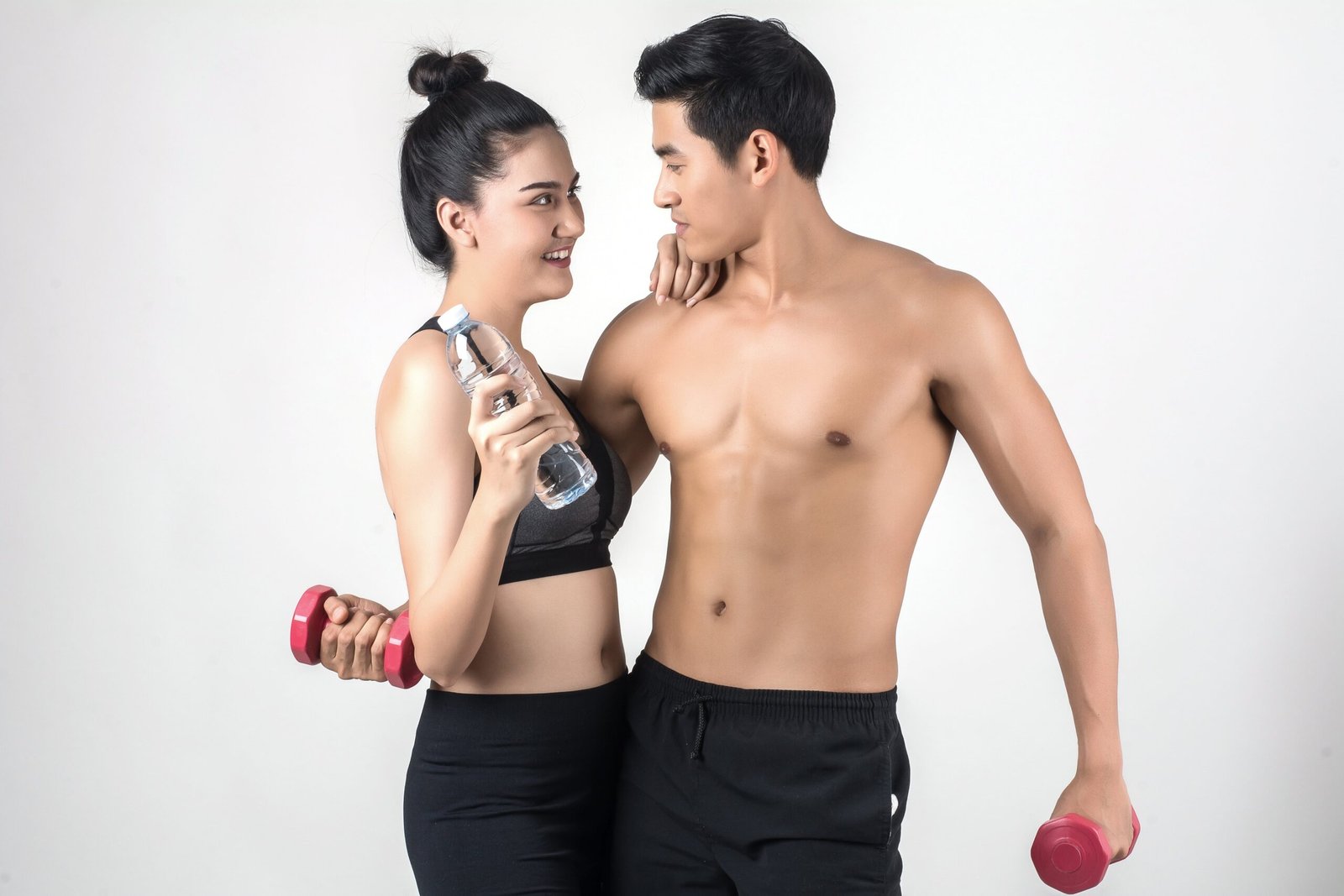 Asian couple wearing fitness gear